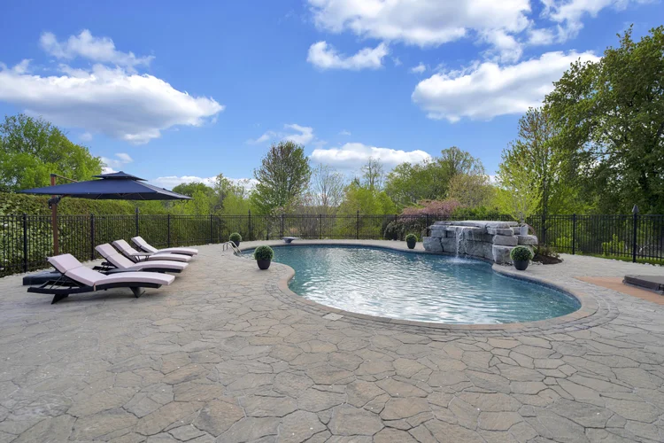 Pool and surrounding terrace at 812 McManus