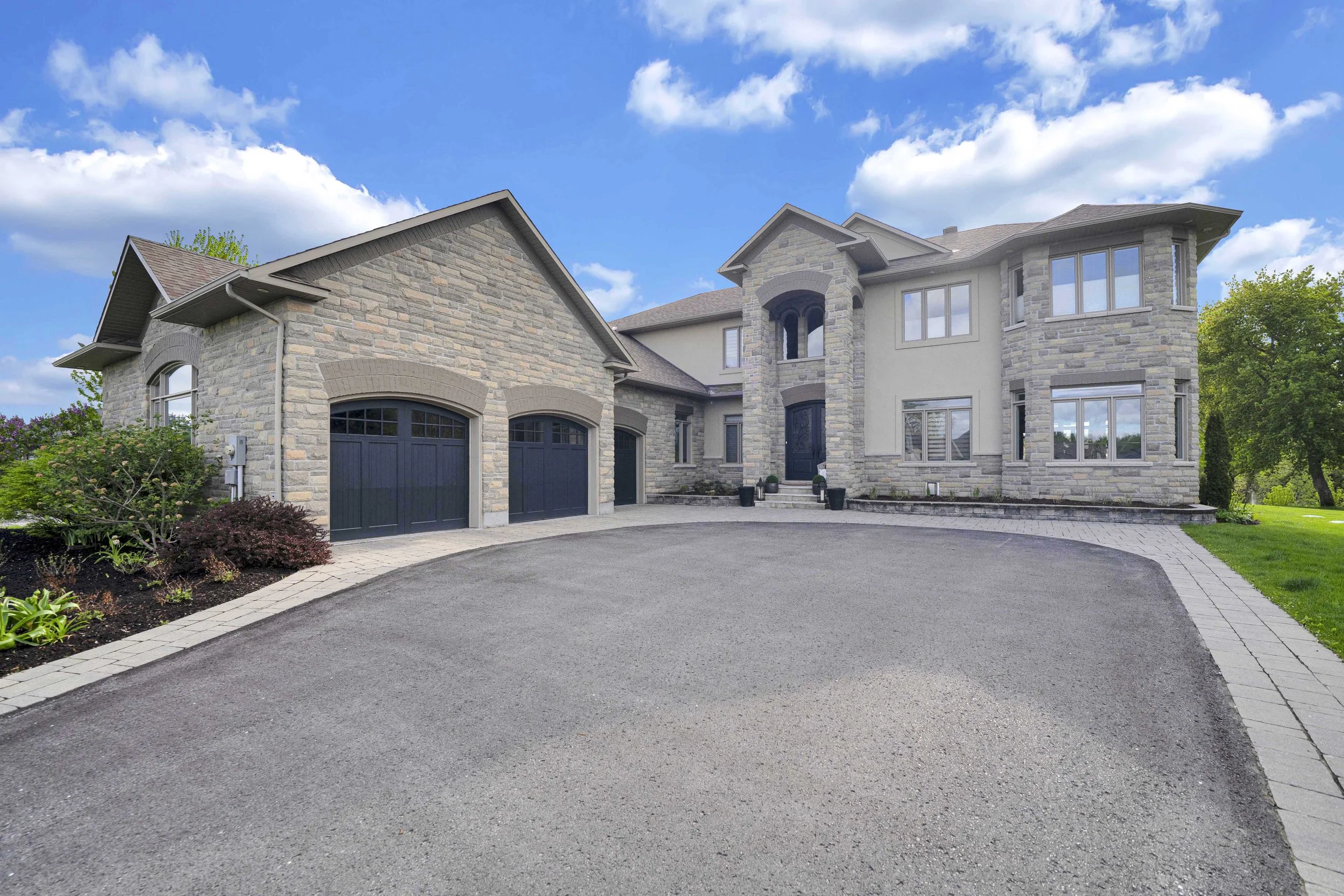 Front exterior and landscaped entrance at 812 McManus Avenue