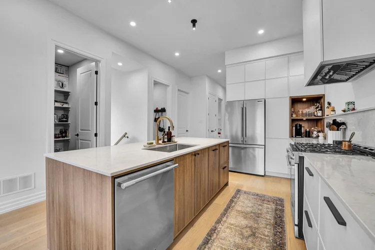 Kitchen island and pantry access at 248 Main Street