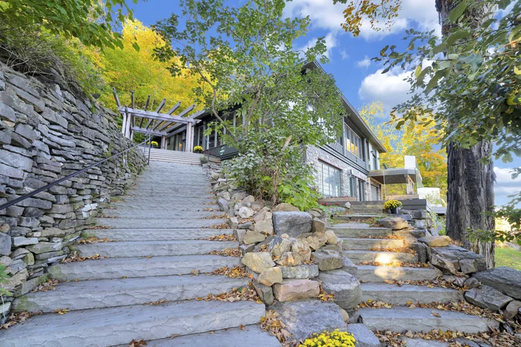 Stone staircase and landscaped garden at 755 Ch. du Lac-Meech, Chelsea