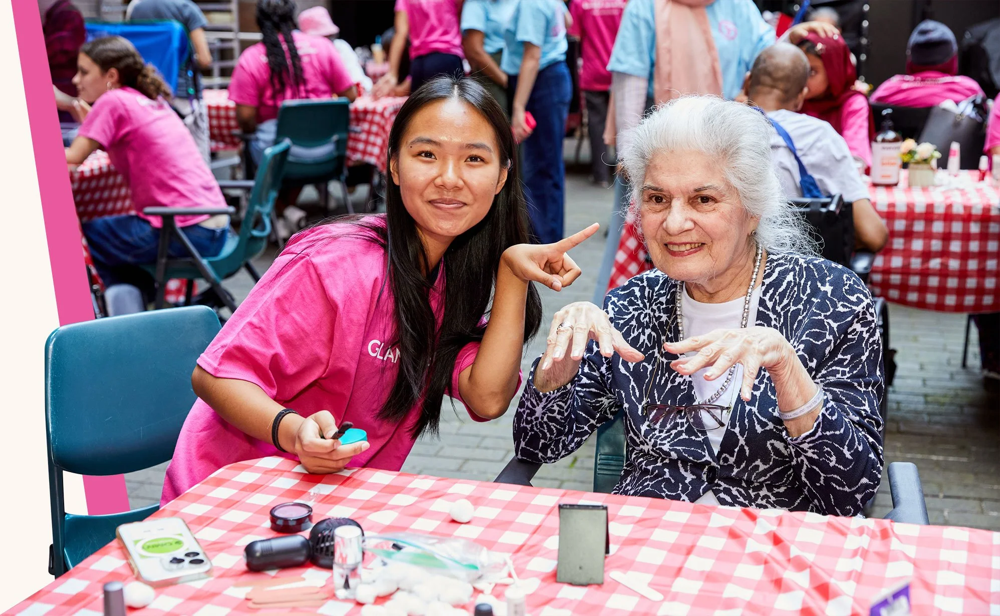 GlamourGals teen volunteer connecting with a senior