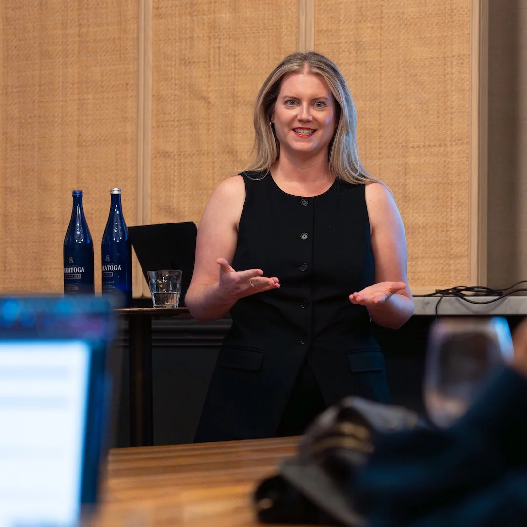 Molly Bossardt presenting at a live workshop