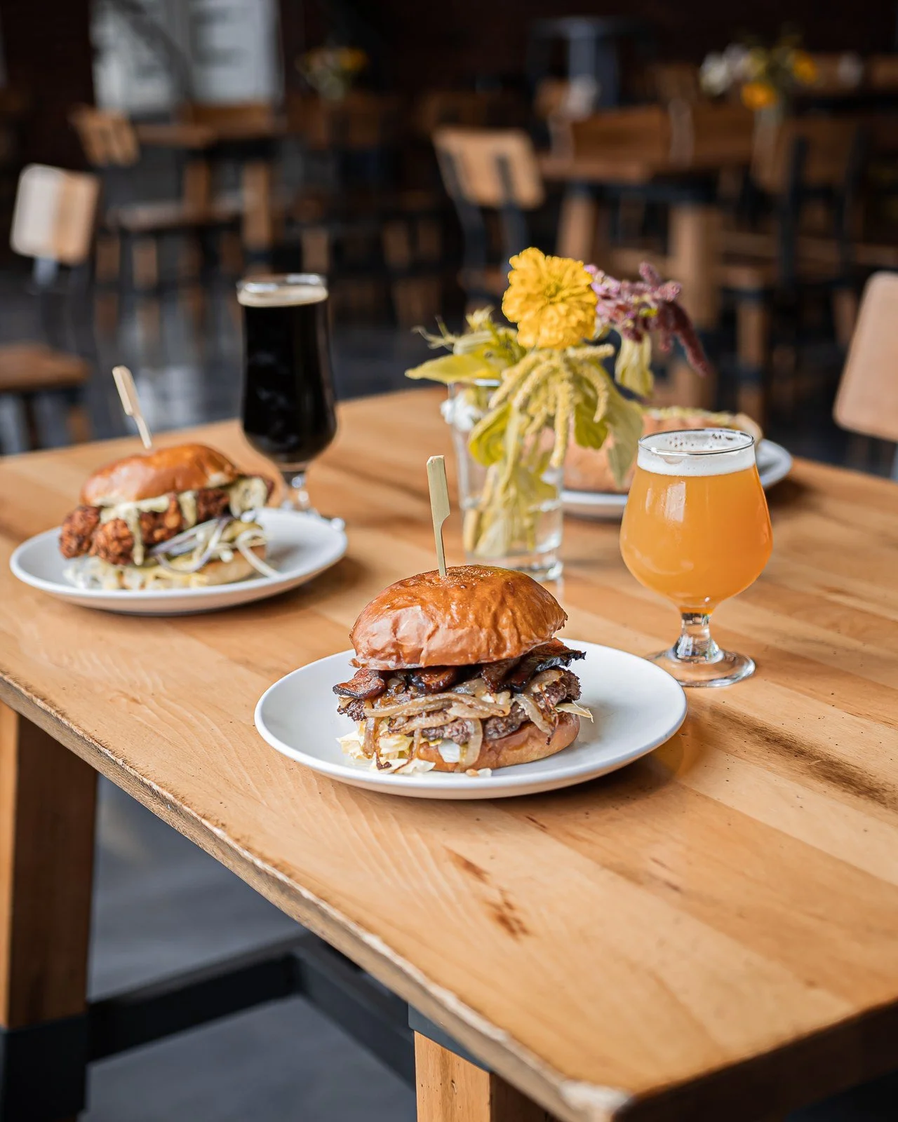 A burger, a fried chicken sandwich, and fresh draft beers at Burlington Beer Co.