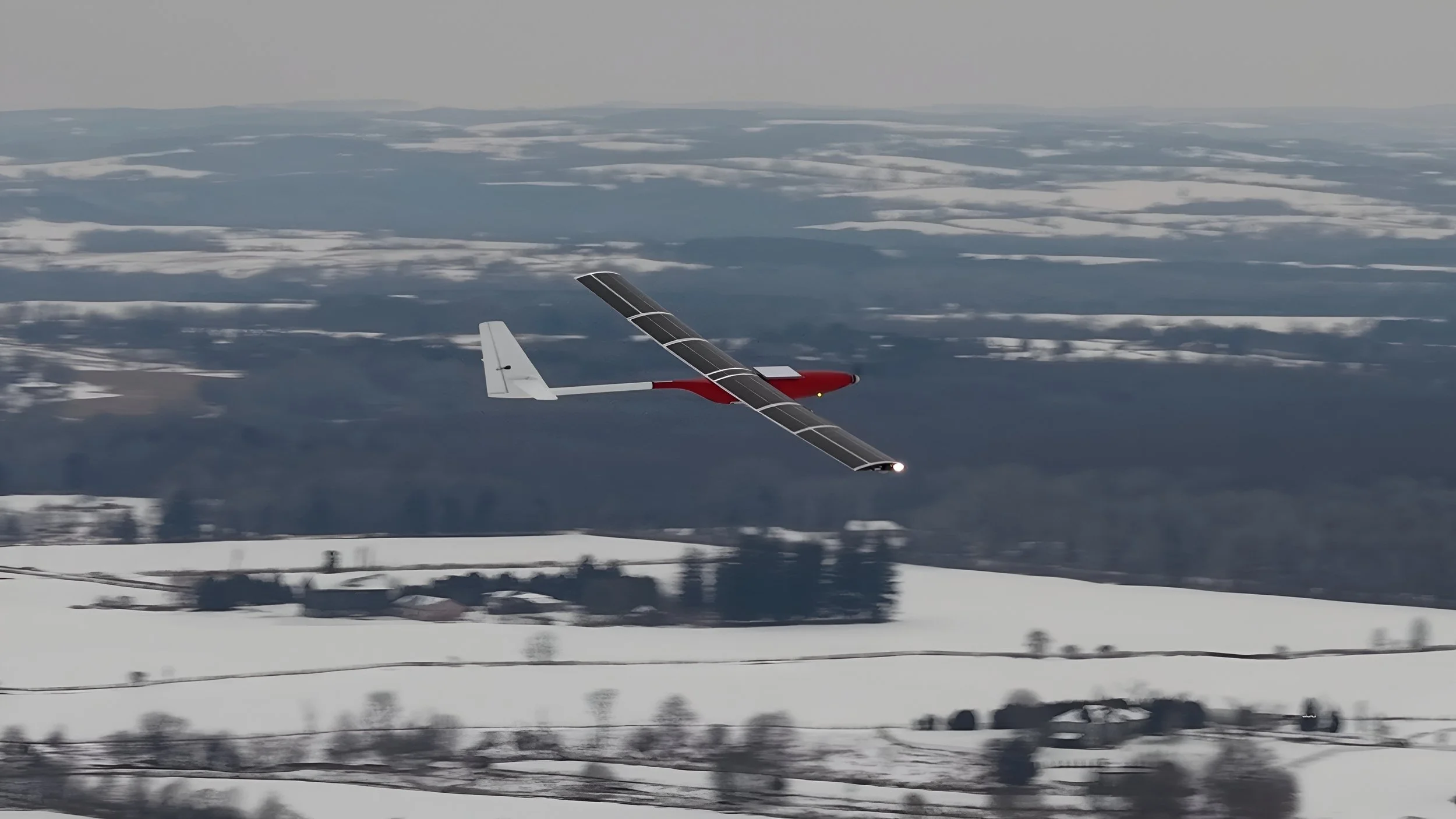 SW-117 long-range flight over snowy landscape