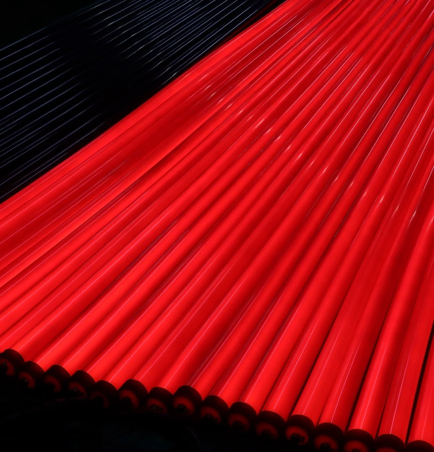 Rows of custom lighting tubes glowing red