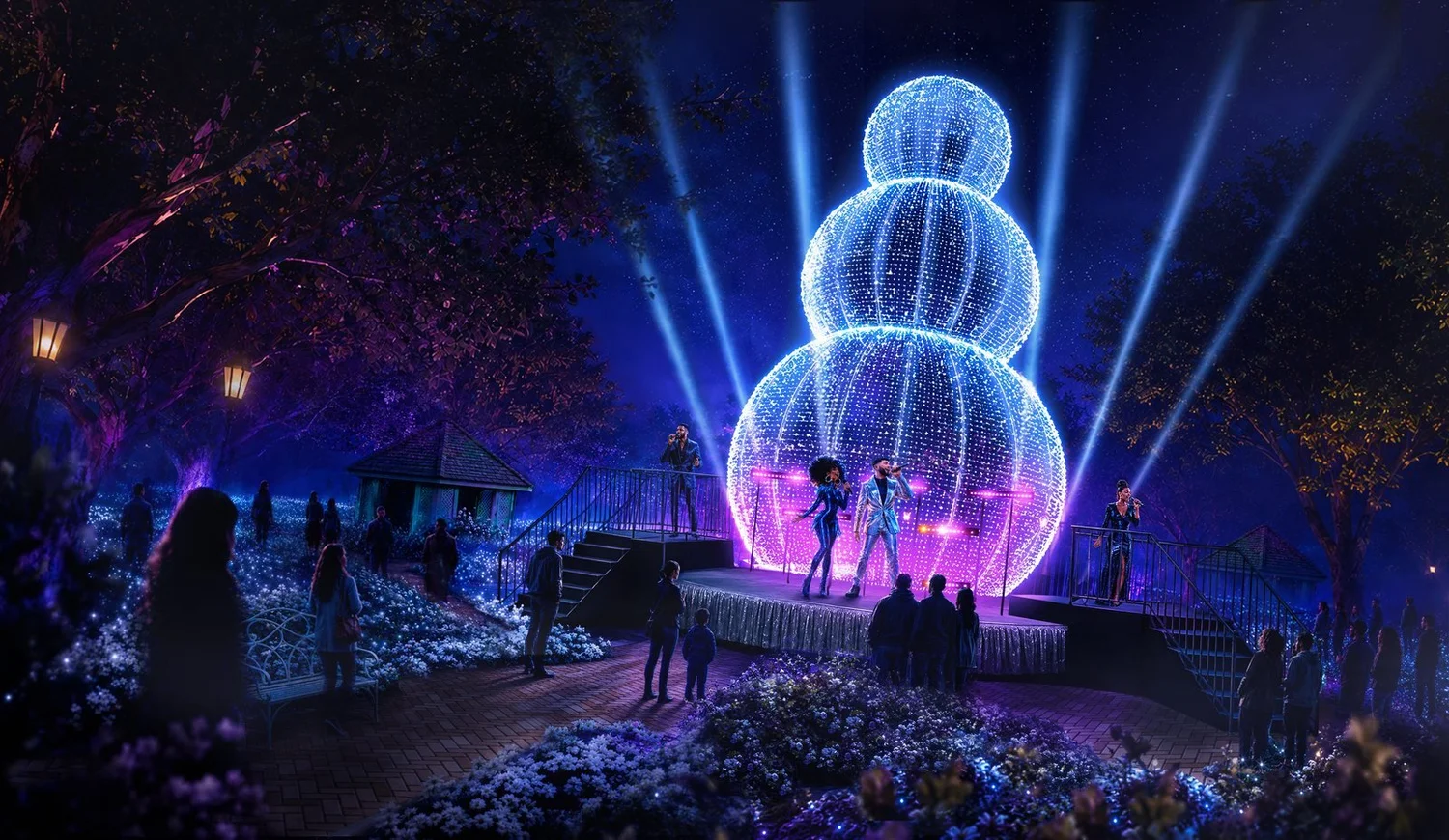 The Snowy Revue, singers performing under a 50 foot LED snowman
