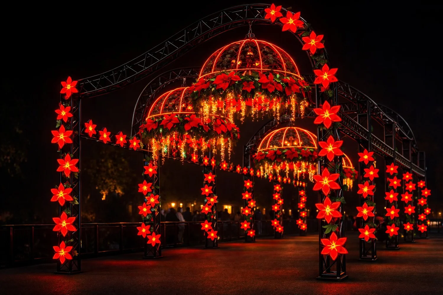 The Poinsettia Promenade, arches of illuminated red poinsettias