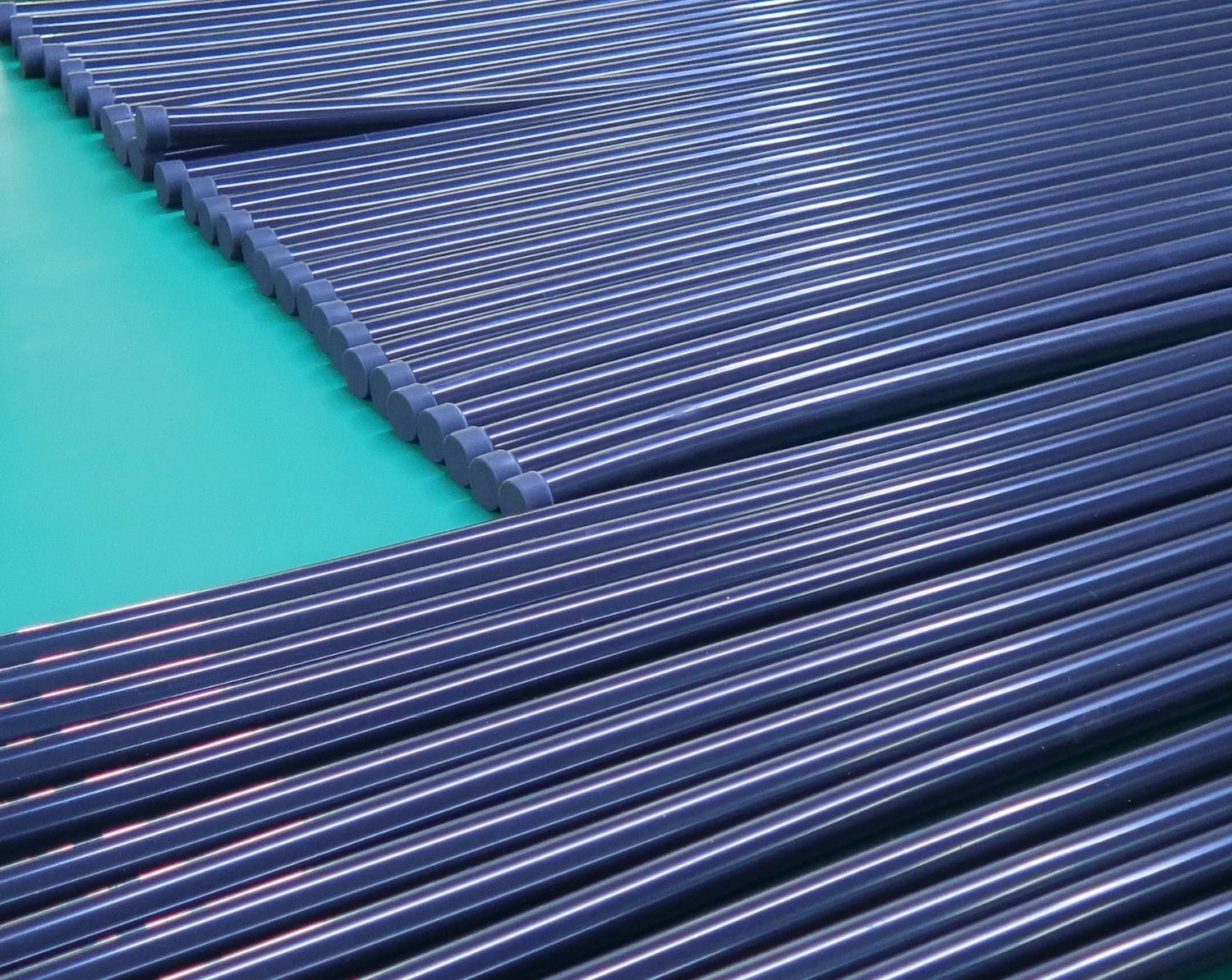 Rows of dark custom lighting tubes before illumination