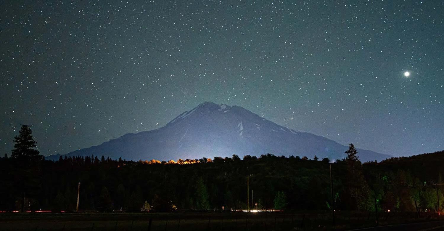 Mount Shasta, California forest cabin retreat setting at night