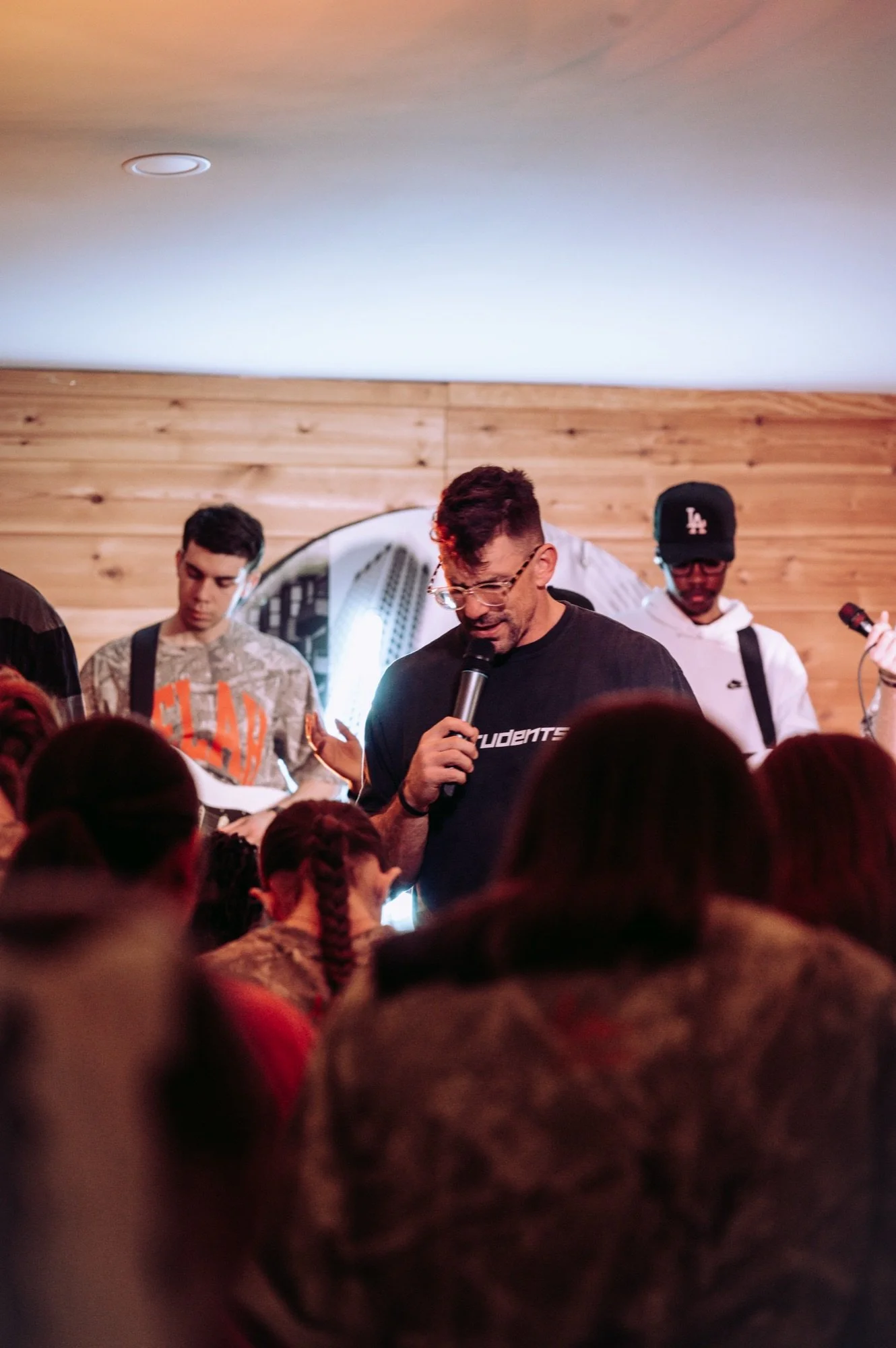 Pastor Dusty Bratzler speaking to students at Anthem Students