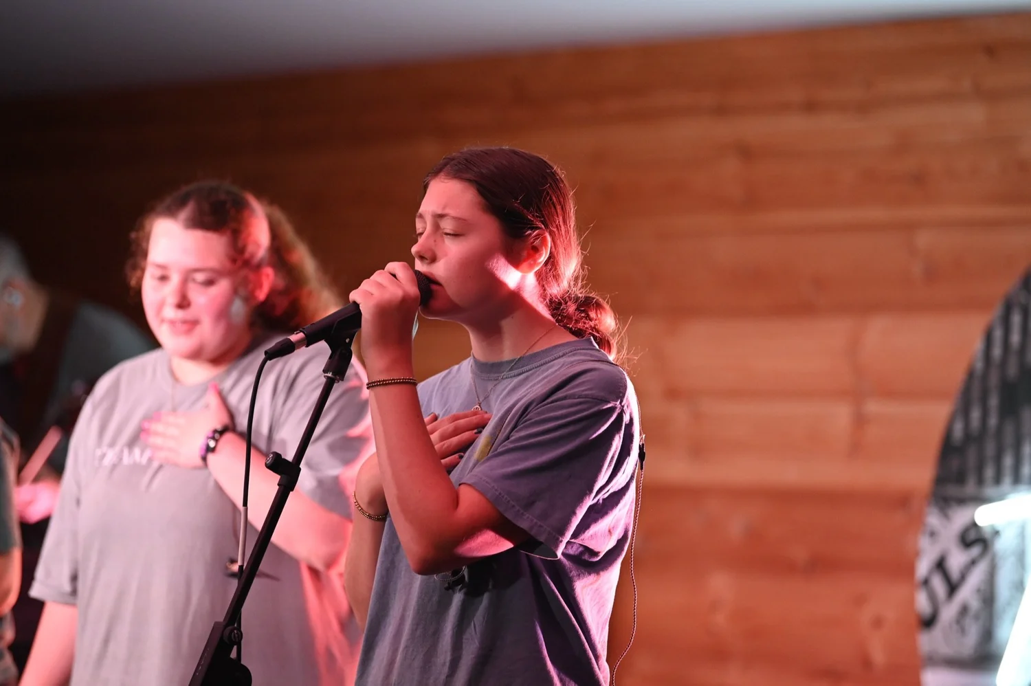 Student vocalists leading worship at Anthem Students