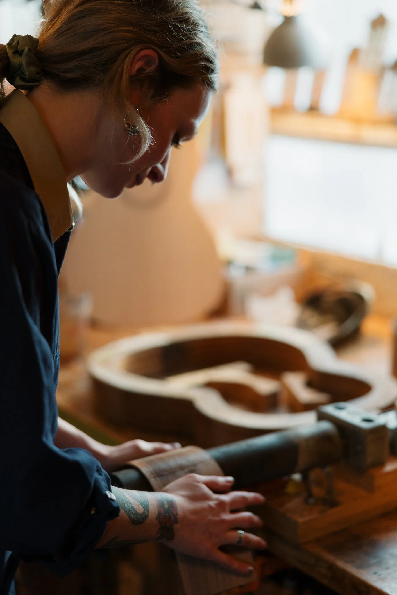Grace at the lutherie bench