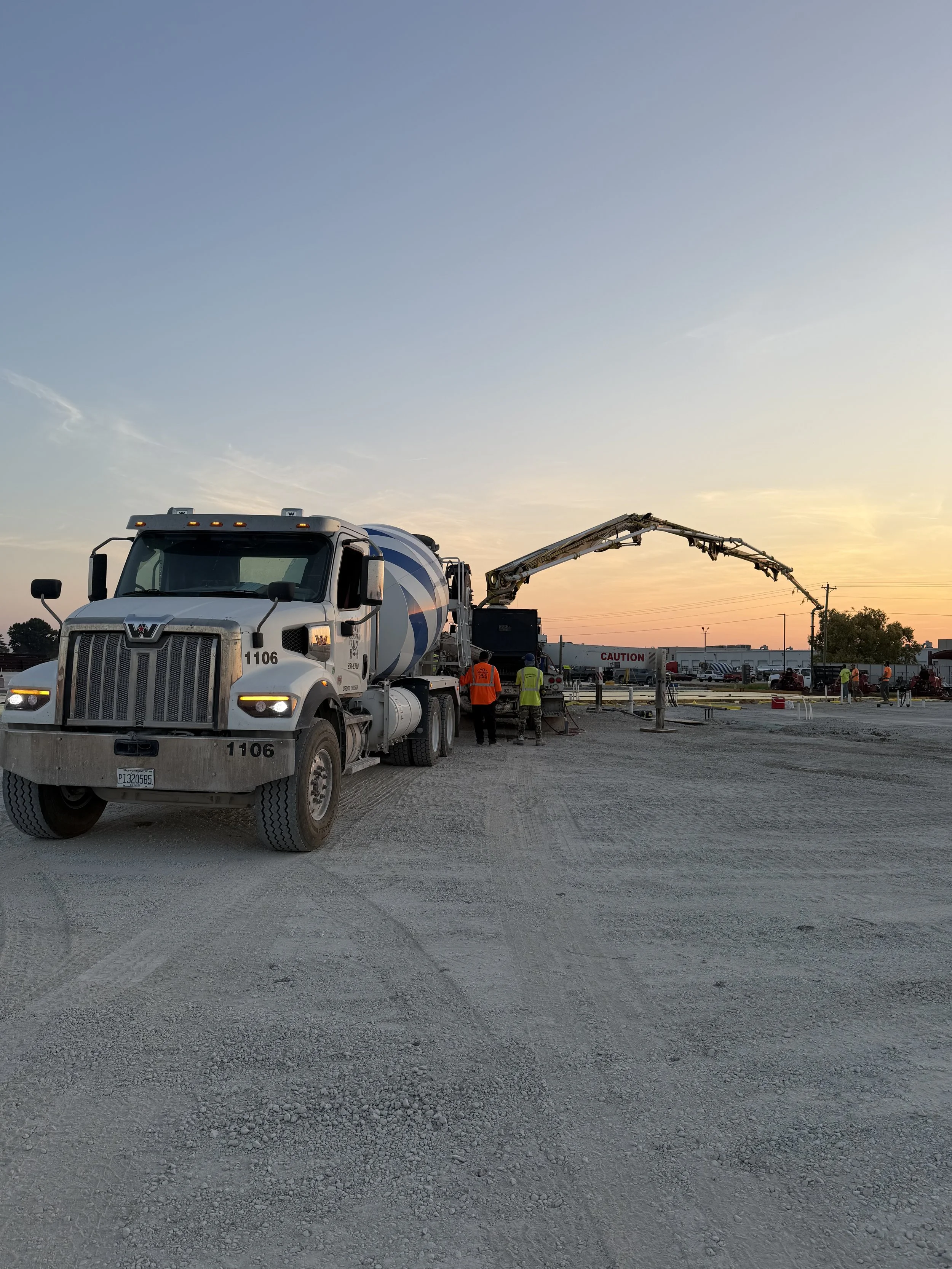 Kienstra Illinois mixer and concrete pump at a Collinsville floor pour