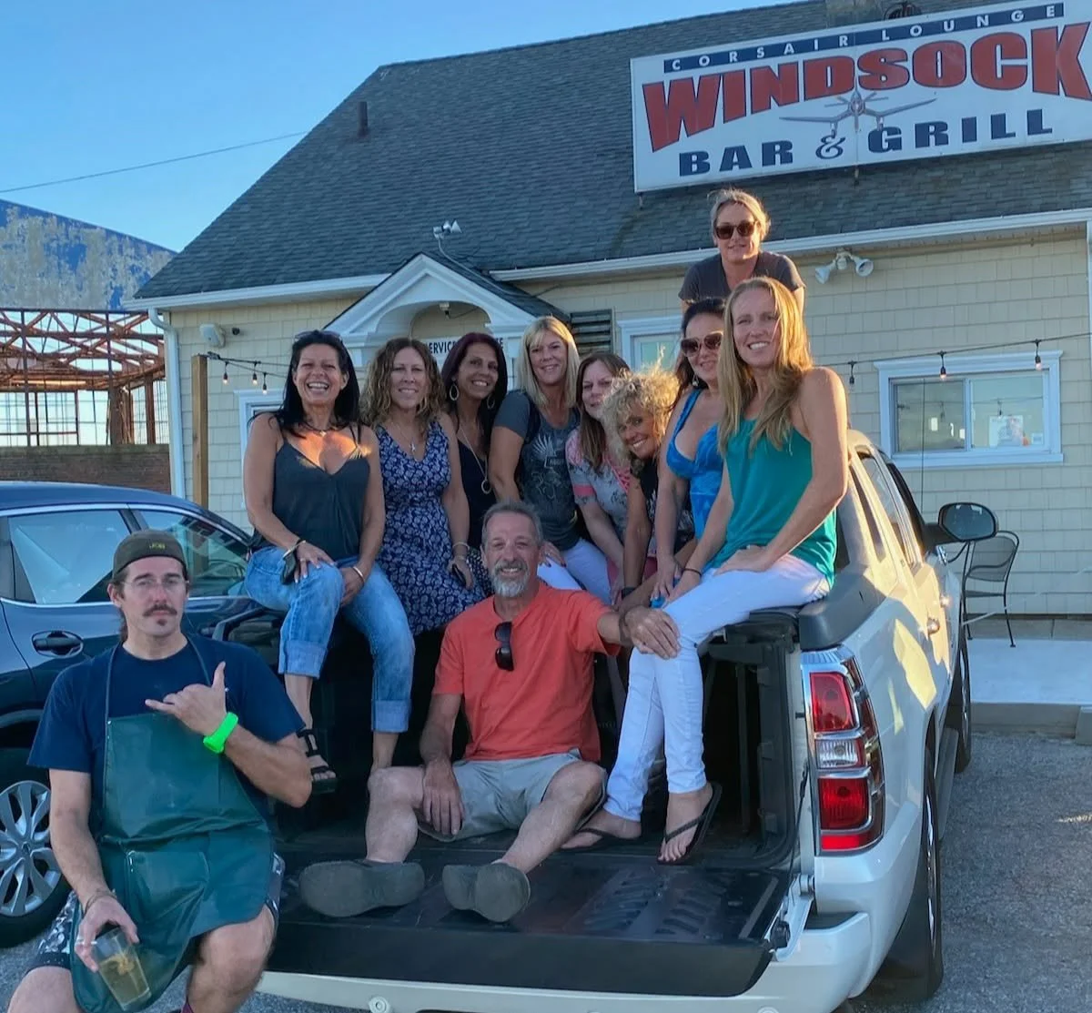 A group outside the Windsock Bar and Grill in Stratford