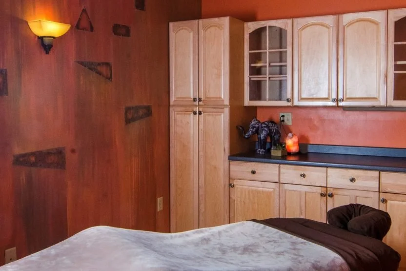 Massage treatment room at Tranquility Mind & Body Wellness Spa in Milford.