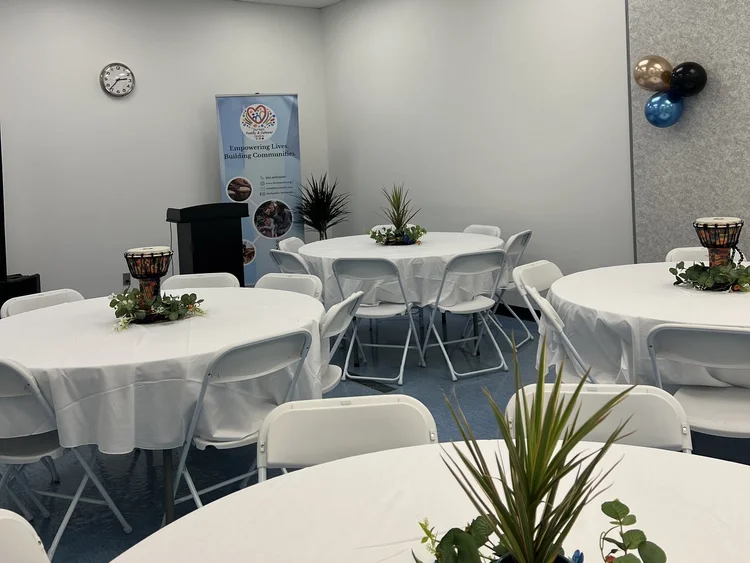 Round tables with centrepieces in the Banquet Hall
