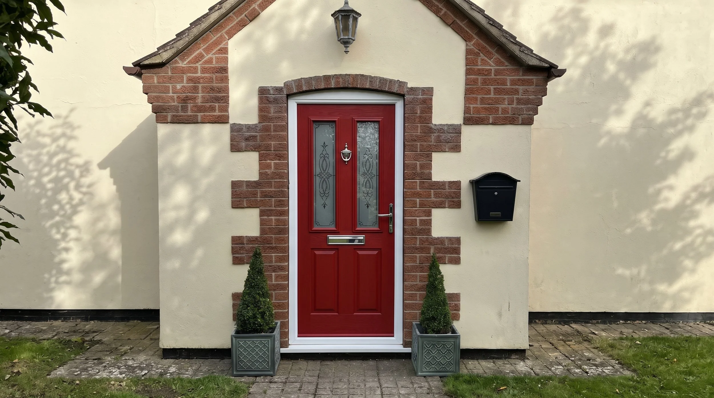 External Doors Online bespoke red traditional GRP composite front door with decorative frosted glass