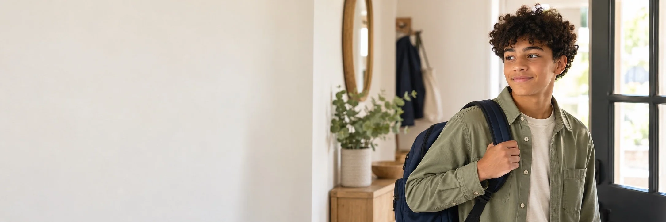 Illustrative image of a teenager with a backpack preparing to leave home for school