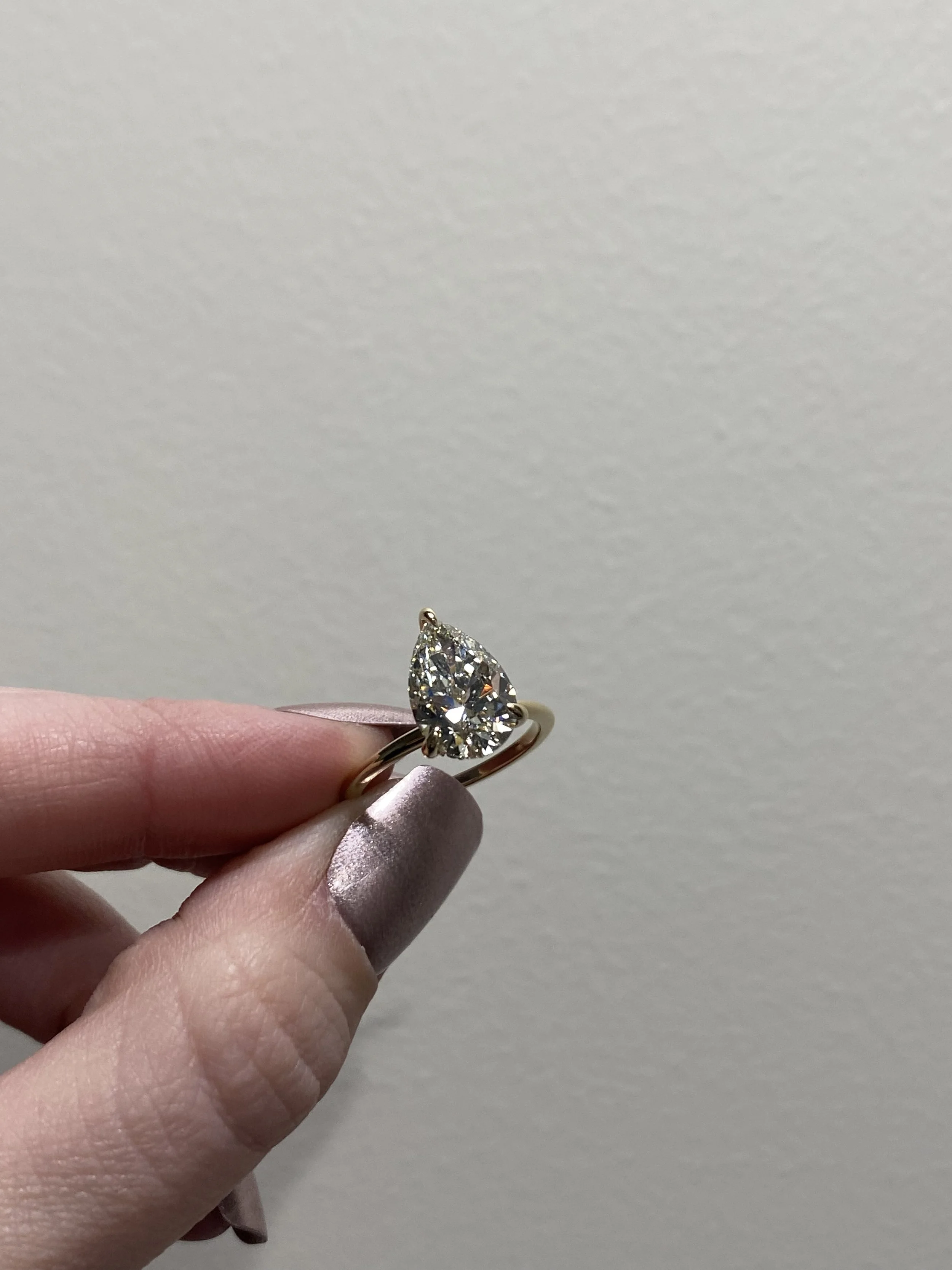 Whisper-thin 1.5mm 14k yellow gold engagement ring with pear-cut diamond before structural failure, A. D'Mae Diamonds Los Angeles