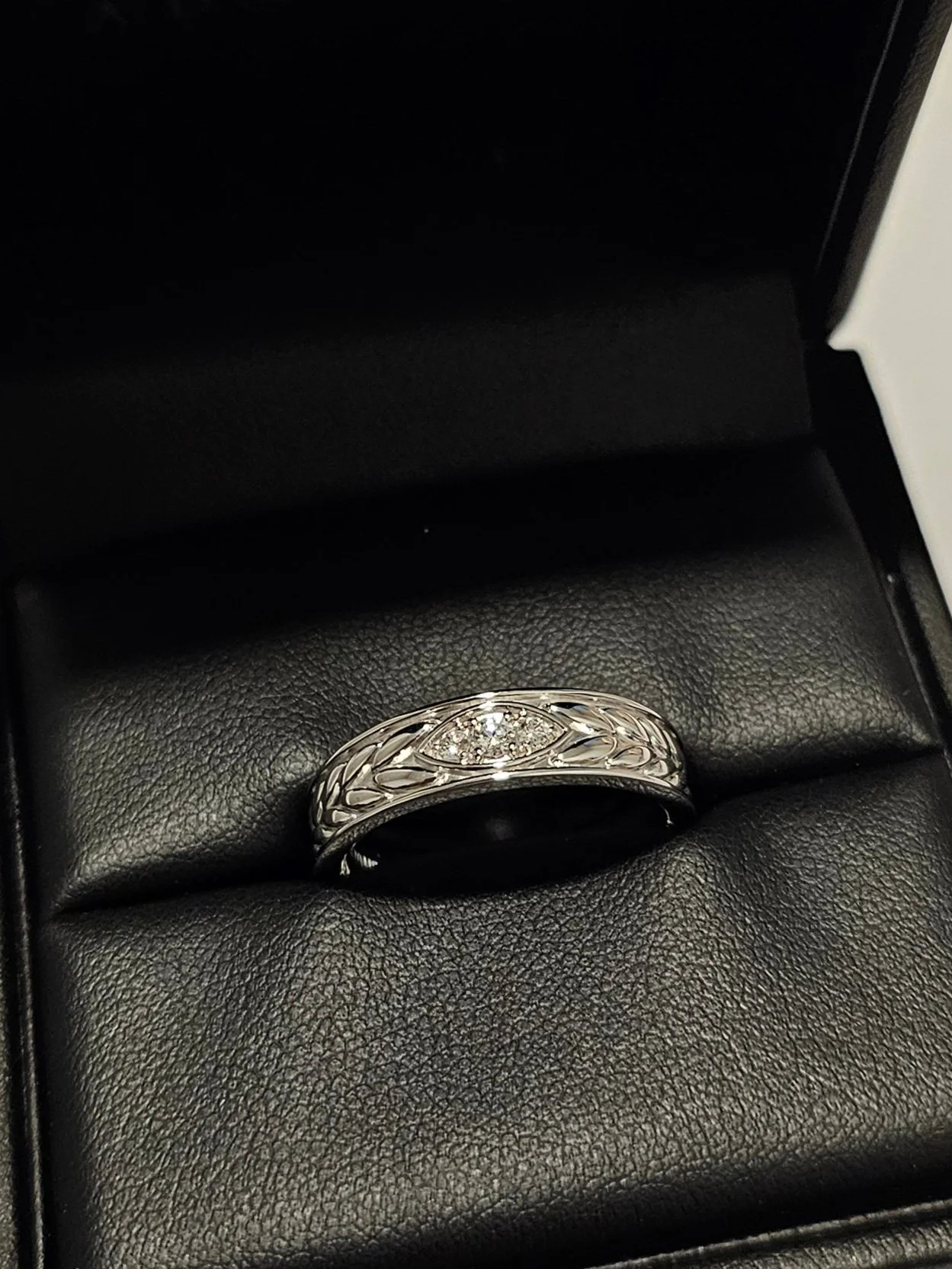 Custom designed men's wedding band by Los Angeles jeweler A. D'Mae Diamonds