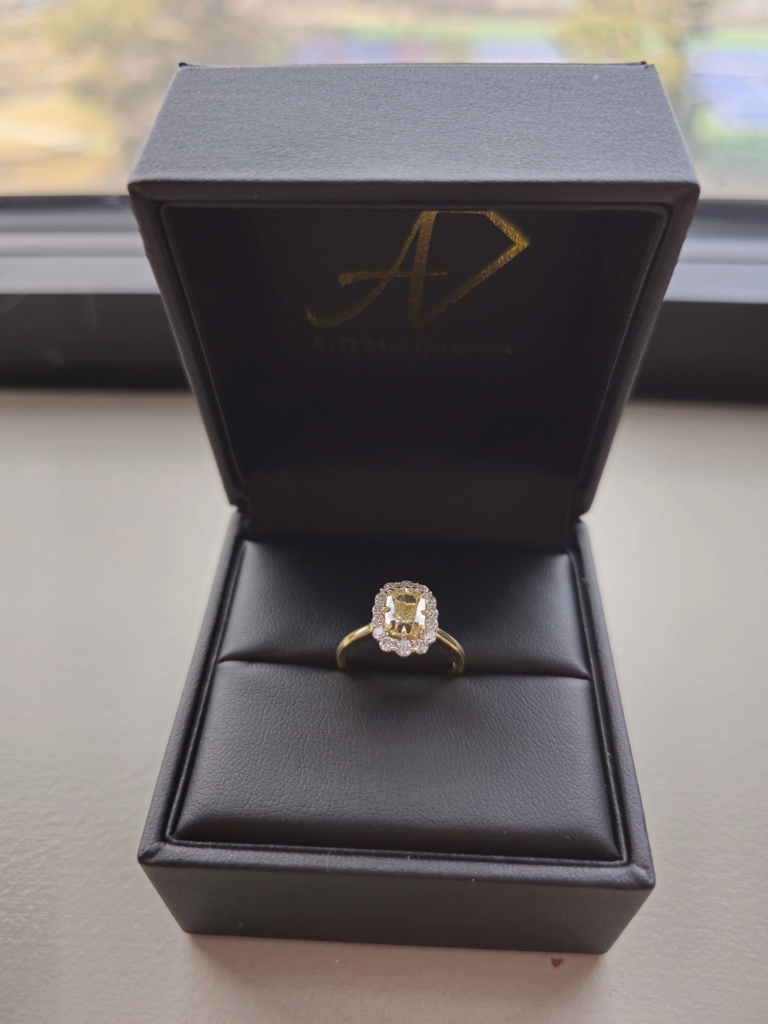 Heirloom yellow diamond halo engagement ring redesigned by Los Angeles jeweler A. D'Mae Diamonds