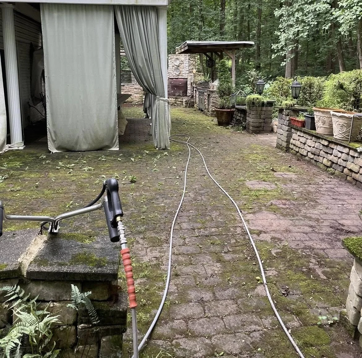 Patio cleaning before Maryland paver restoration Pasadena