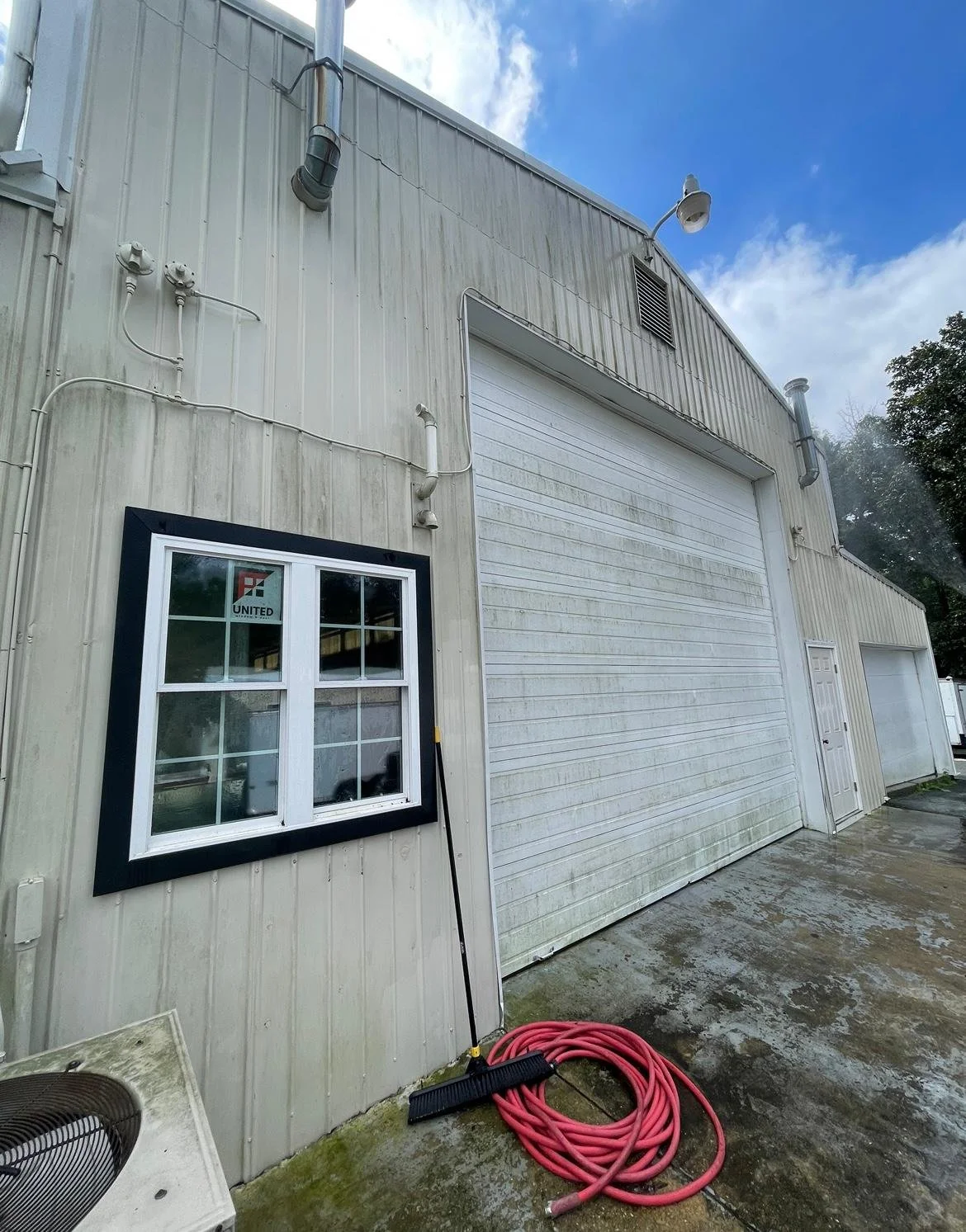 Commercial building before Chestertown MD algae siding smoke buildup