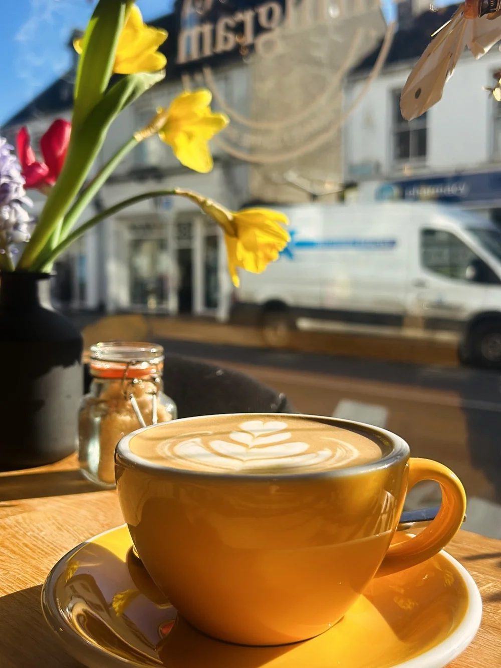 A flat white in the window seat at Milligram on Wine Street, Sligo