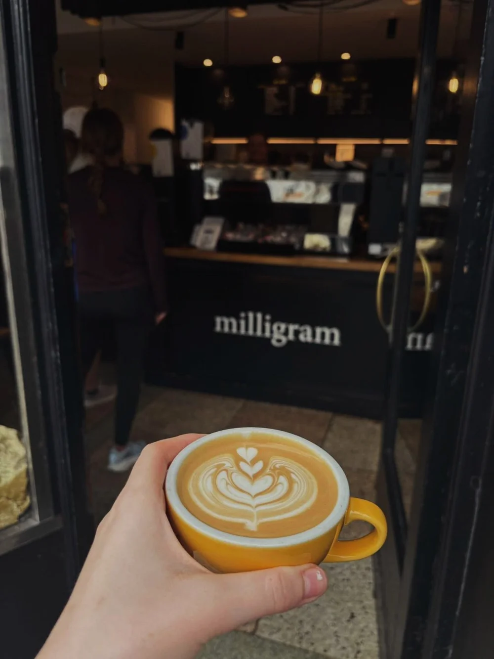 A flat white at the counter inside Milligram Coffee, Wine Street, Sligo