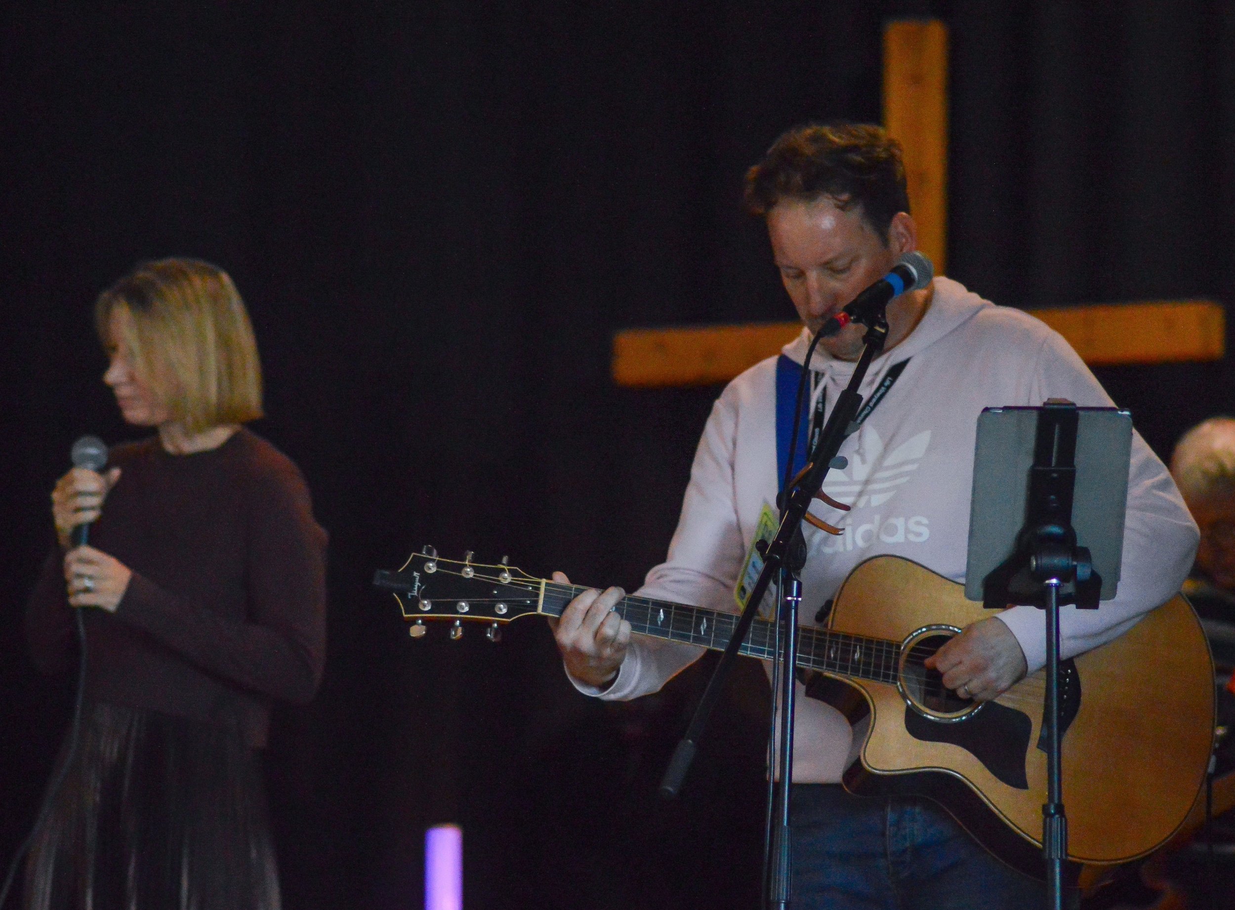 People worshipping together at Life Vineyard Church