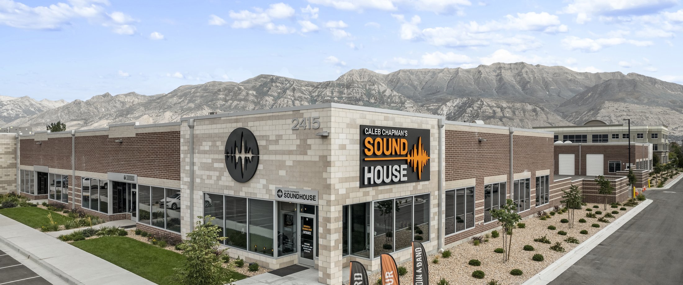 The Soundhouse building in Pleasant Grove, with Mount Timpanogos behind it.