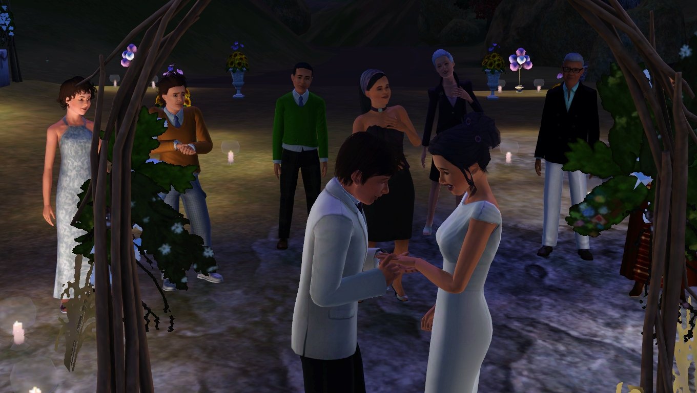 In the foreground, Matthew slips a ring onto Dorothy’s finger and she smiles. The midground is full with Matthew’s family: Aria, Ryker, Mason, Emery, Bridget, and Altman.