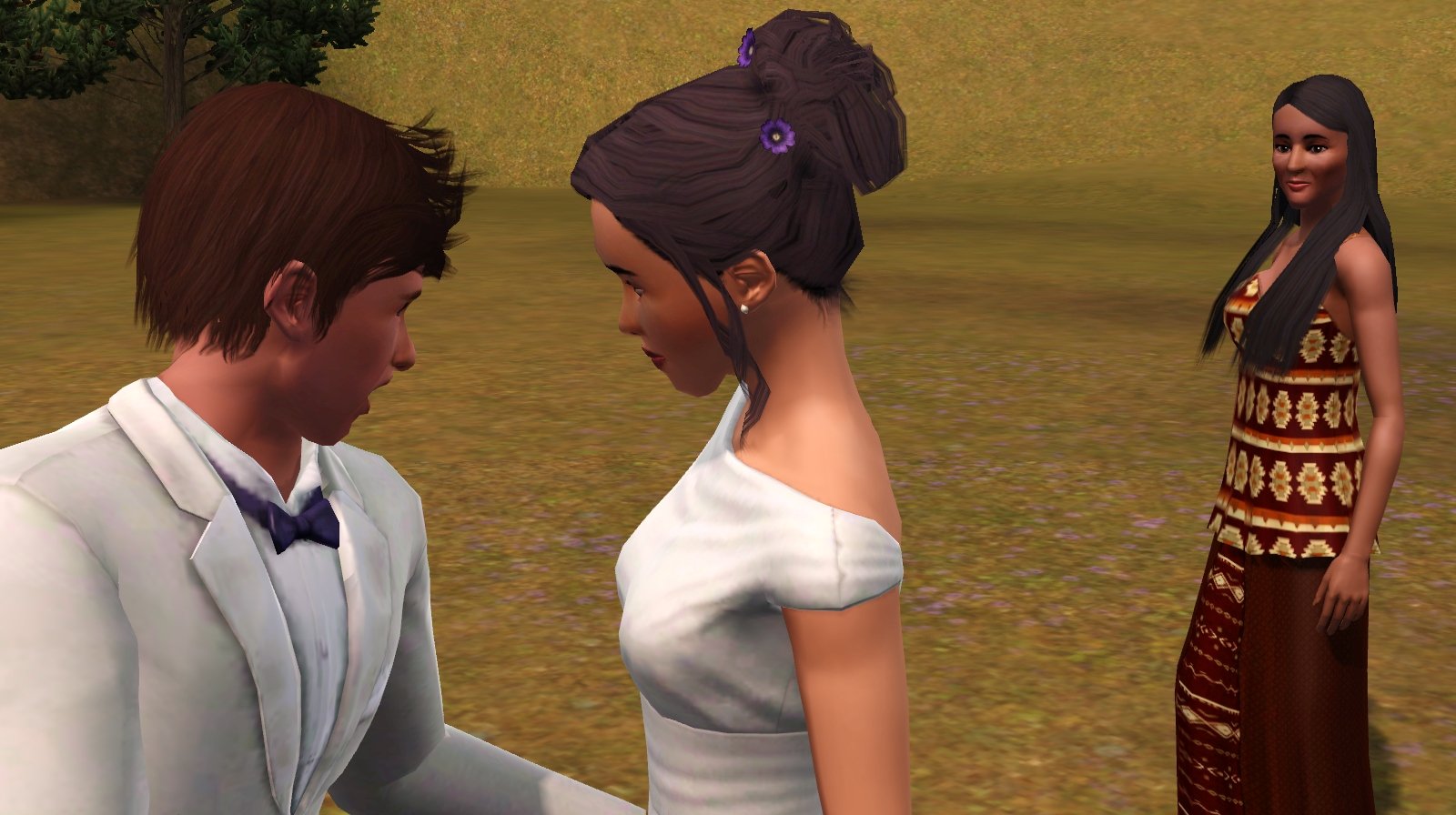 In the foreground, Matthew leans towards Dorothy but speaks towards a townie Sim in the midground, Sage Oxendine. Matthew and Dorothy are in their wedding outfits, while Sage is in her default maroon and gold top and skirt.