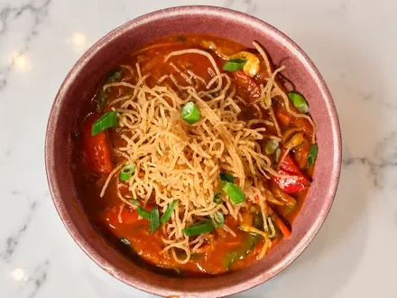 Vegan chopsuey with crispy noodles and Indo-Chinese vegetables at Masti Indian restaurant Fitzroy