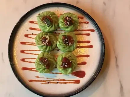 Steamed momos dumplings with chutney at Masti Indian restaurant Fitzroy