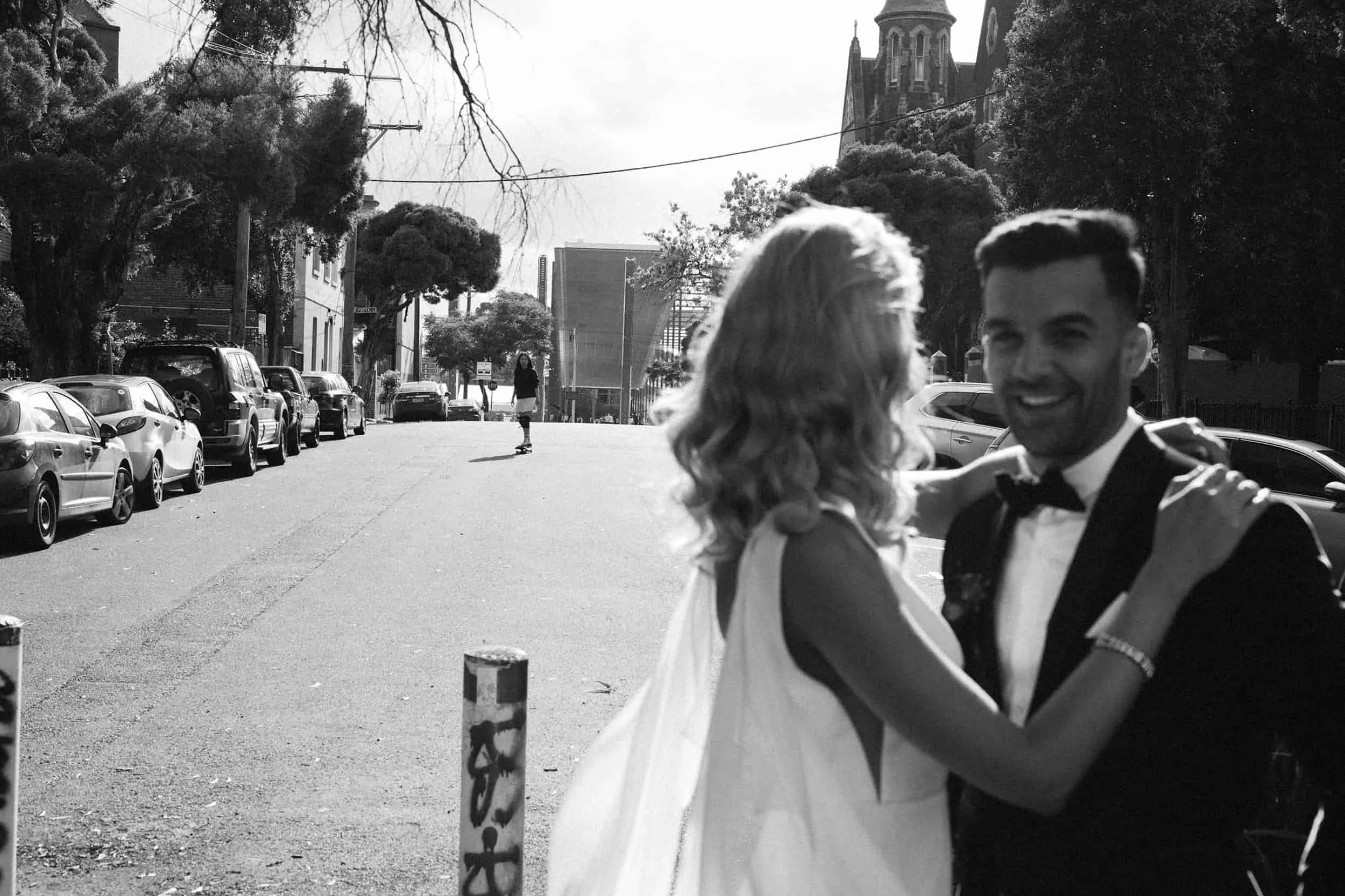 Black and white — couple dancing in the street, movement and joy