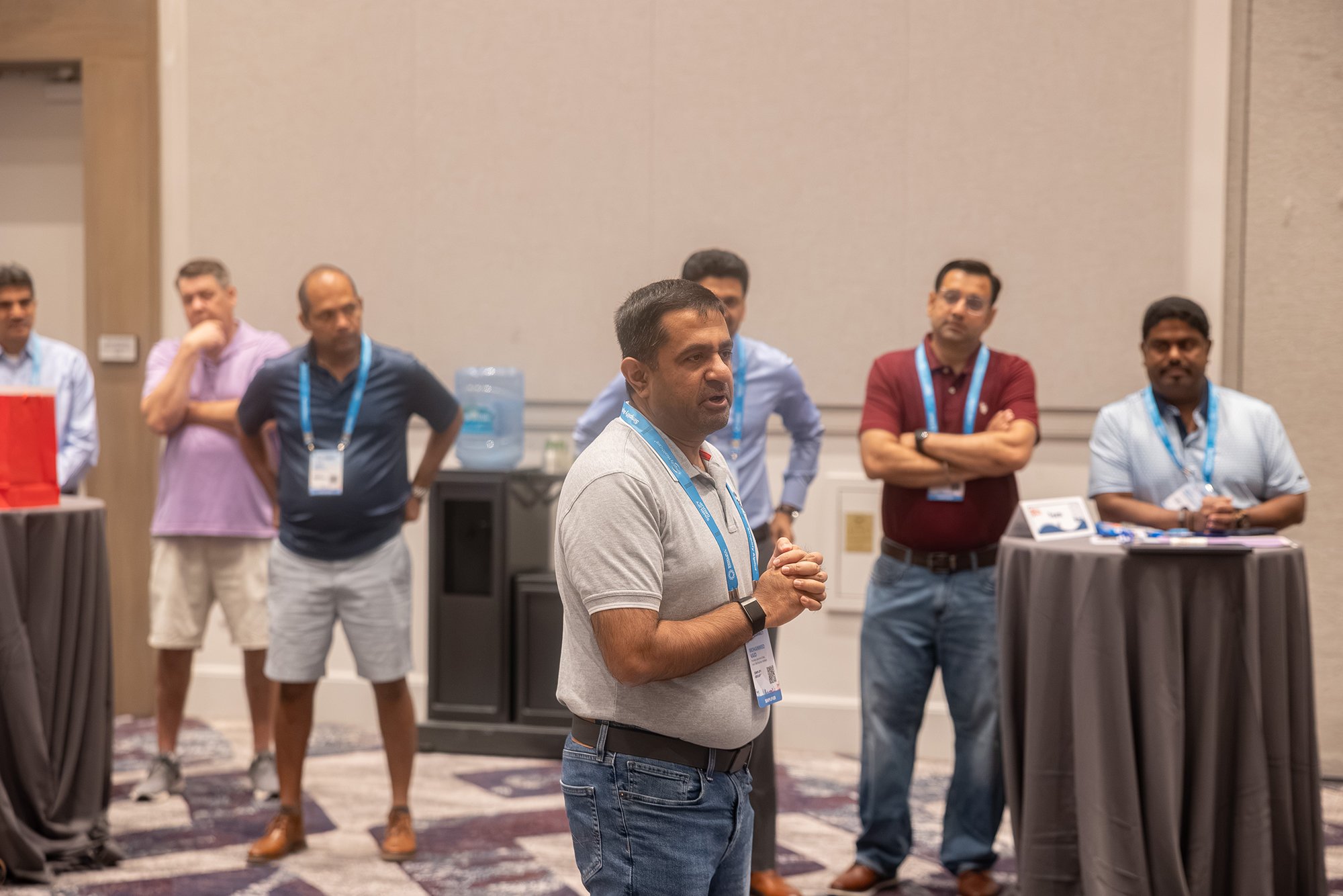 An attendee addresses the room during the Build-A-Bike charity event.