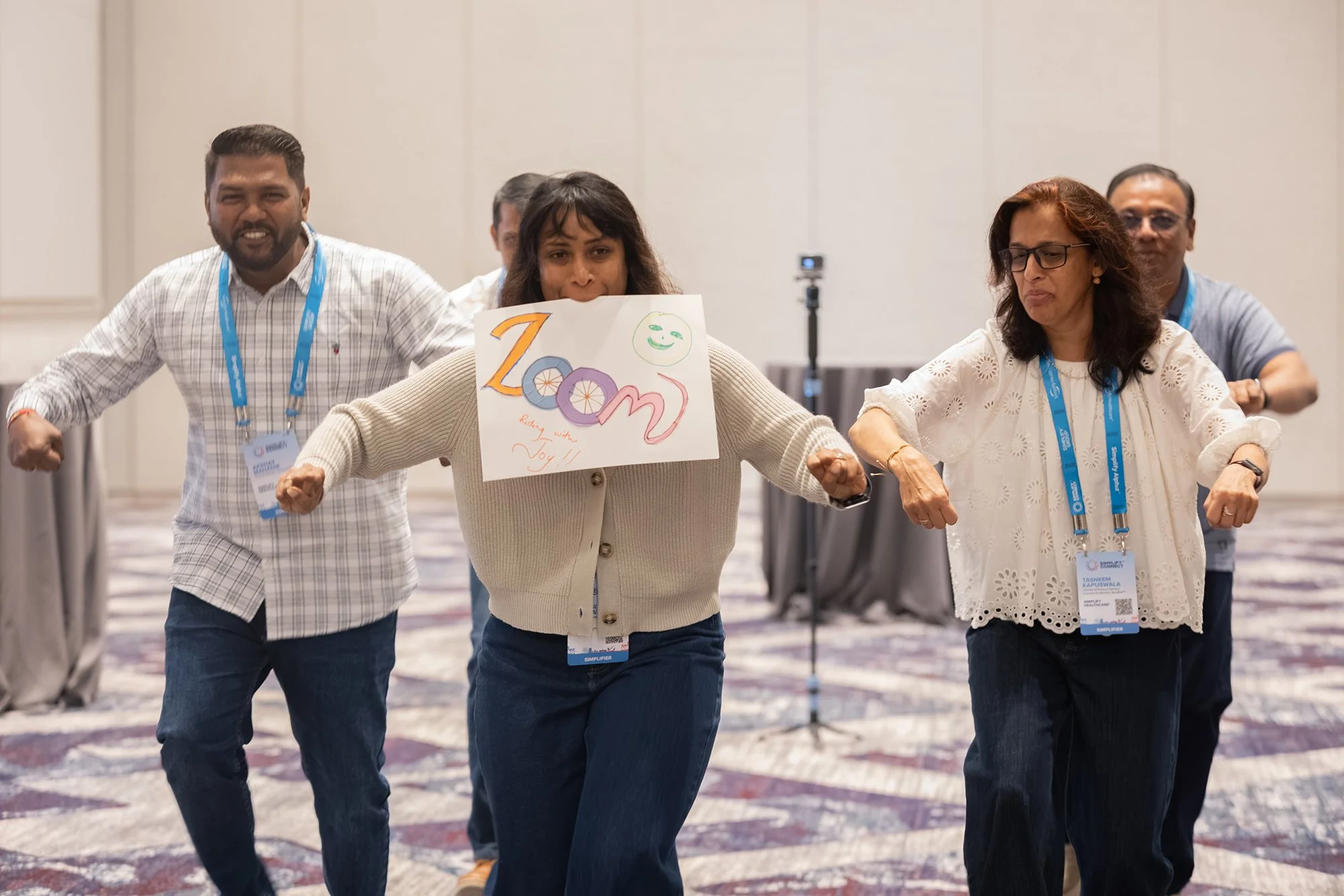 Participants take part in a team activity at Simplify Connect.