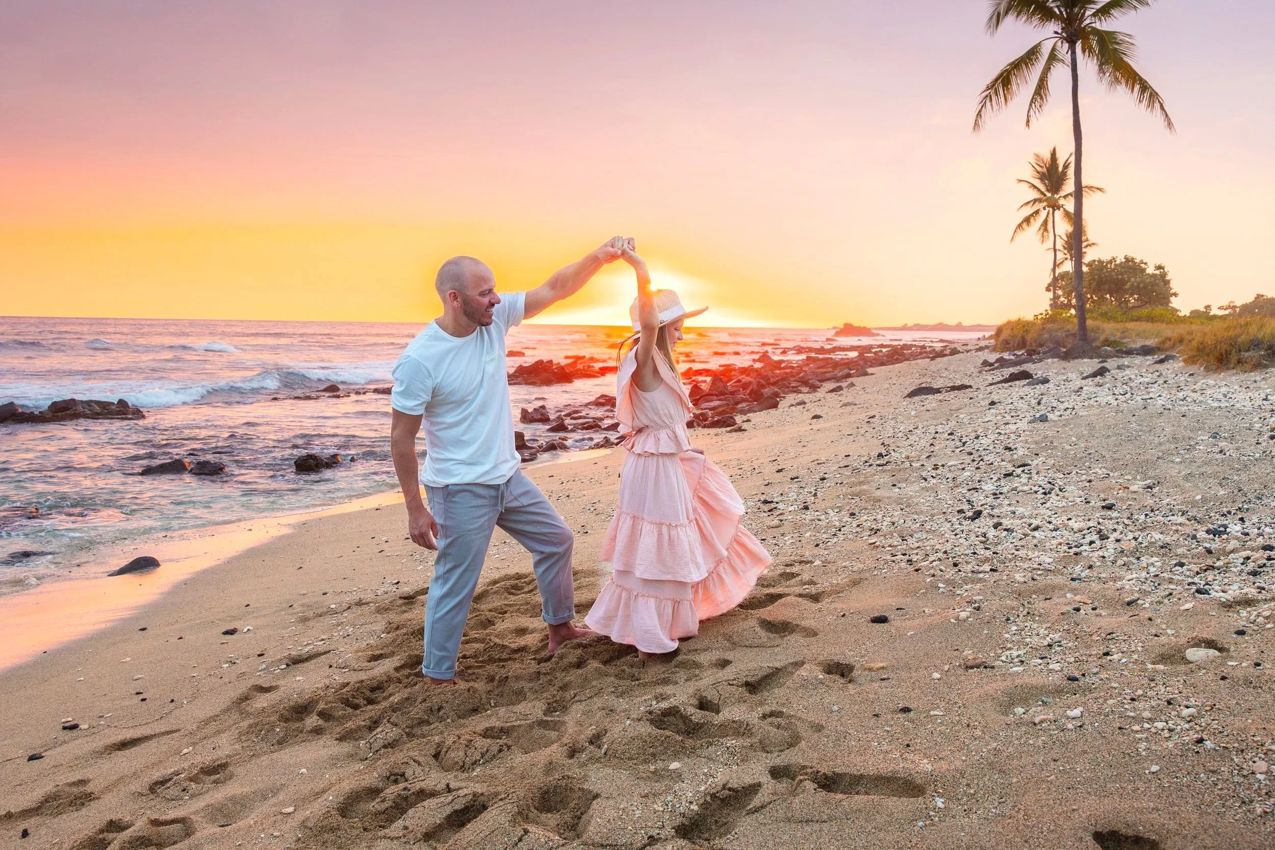 Big Island family walking together on the beach