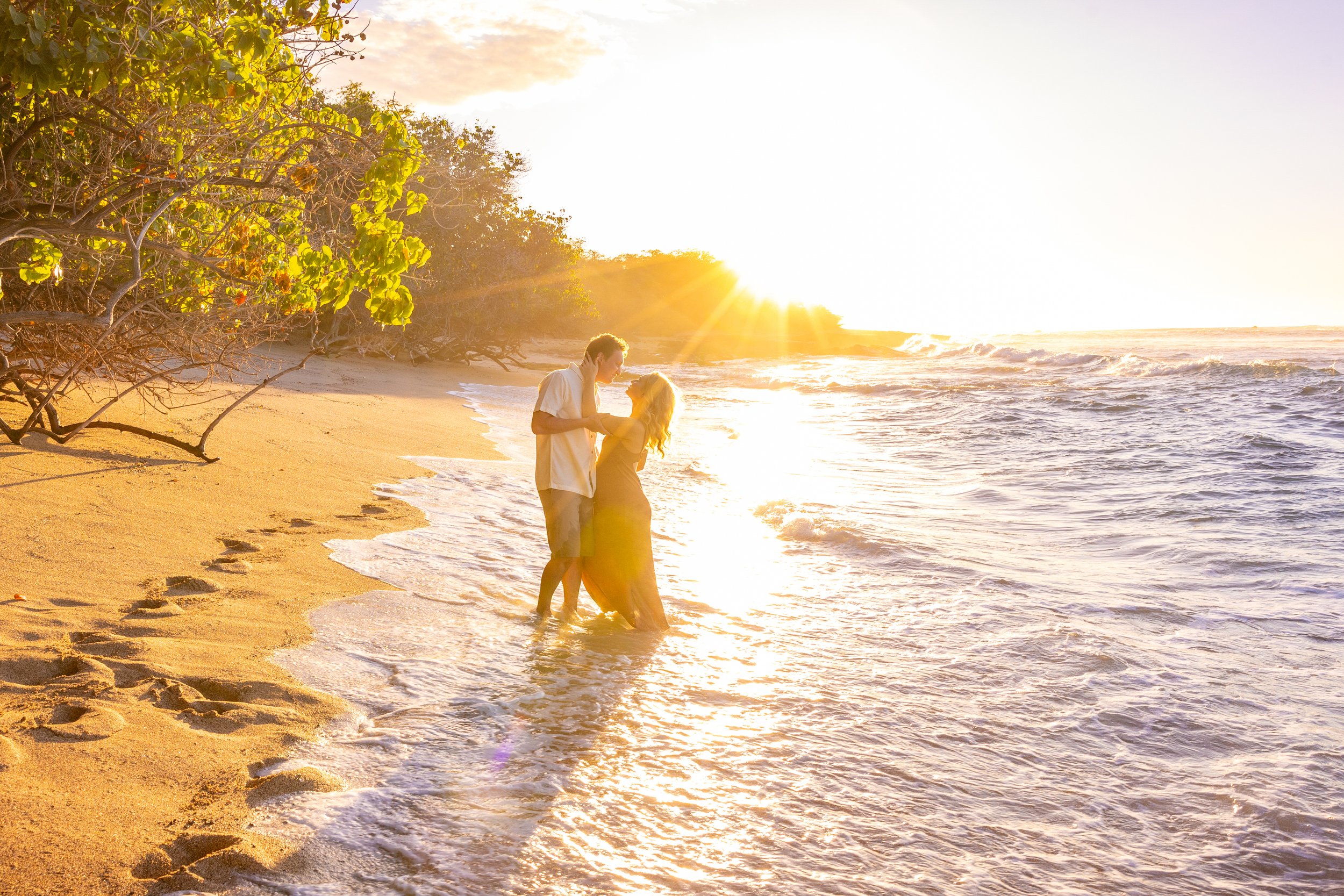 Family laughing at golden hour on the Big Island