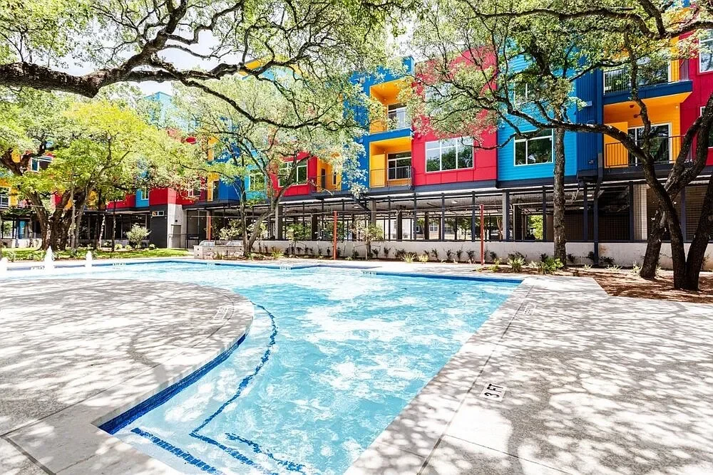 Colorful building and courtyard at Aspire North Austin
