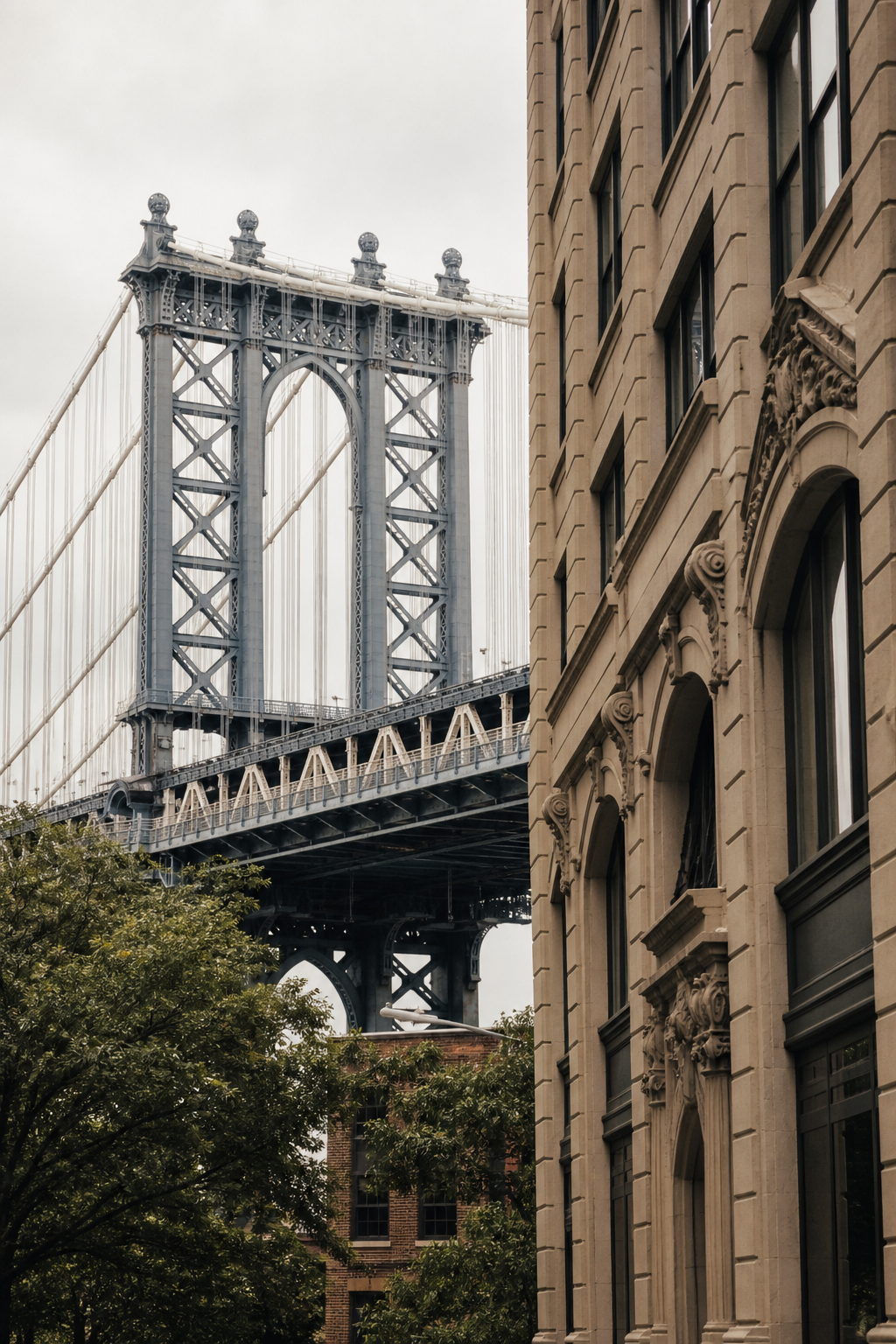 The Manhattan Bridge framed by Brooklyn architecture