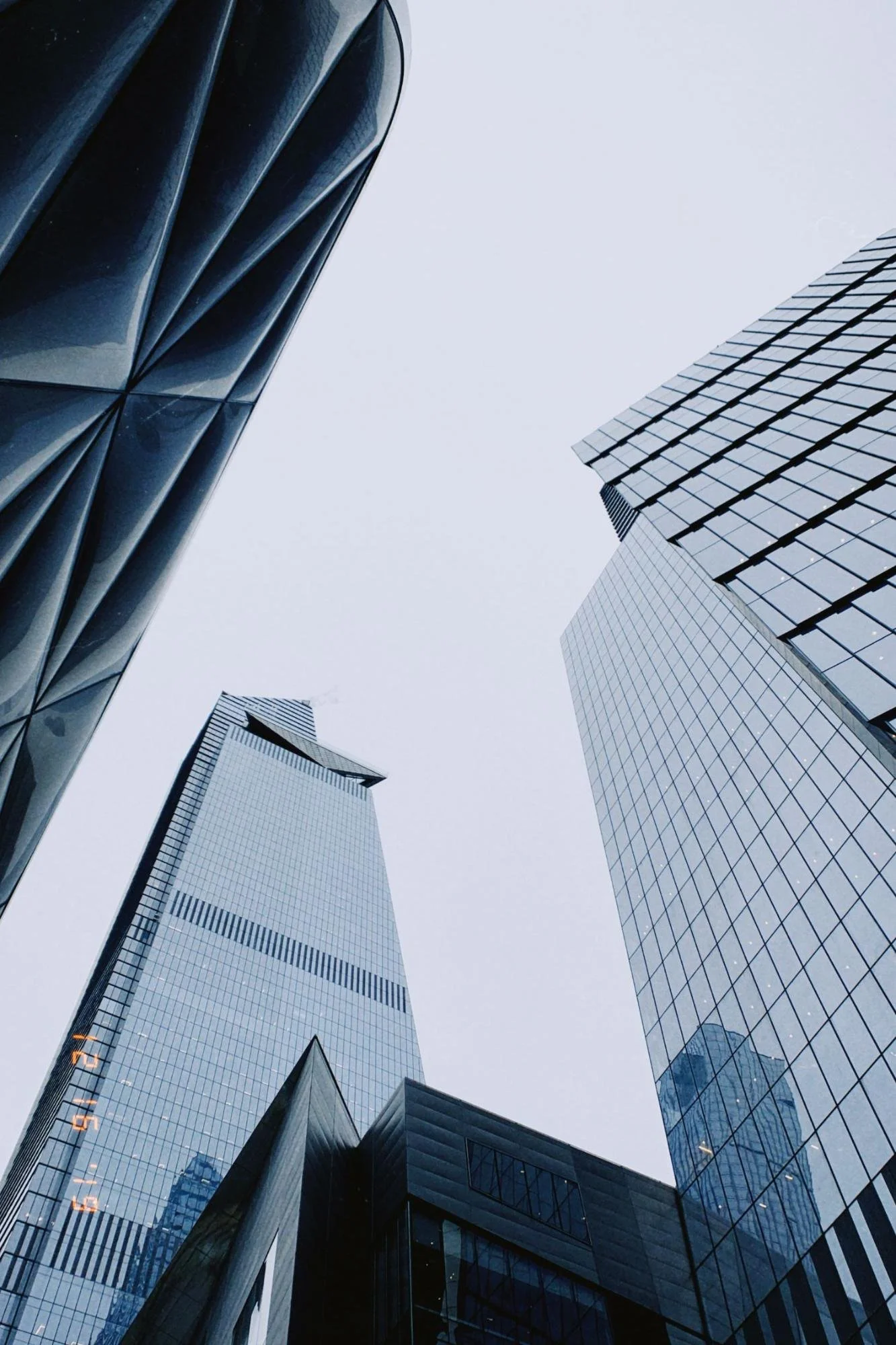 Glass towers seen from street level