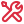 Icon of a red wrench over a red screwdriver