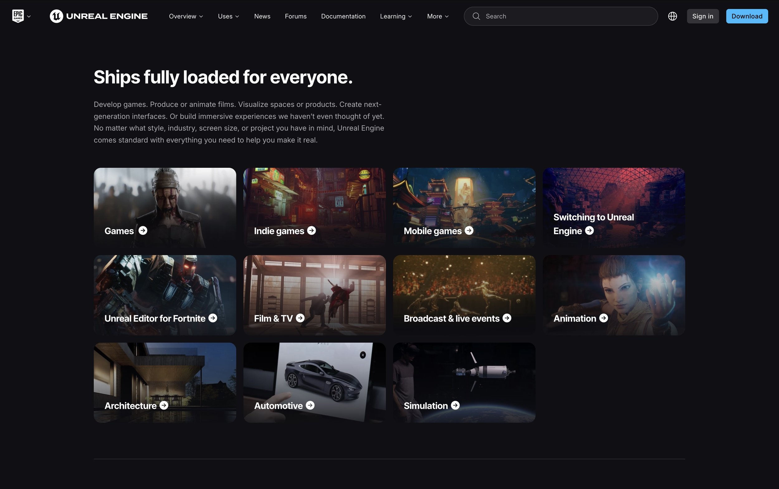 Educators and students reviewing Unreal work together on large displays.