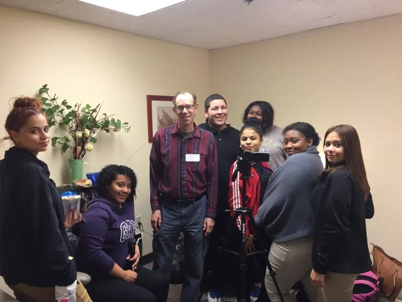 A community group gathered in an office.