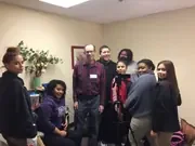A community group gathered in an office.