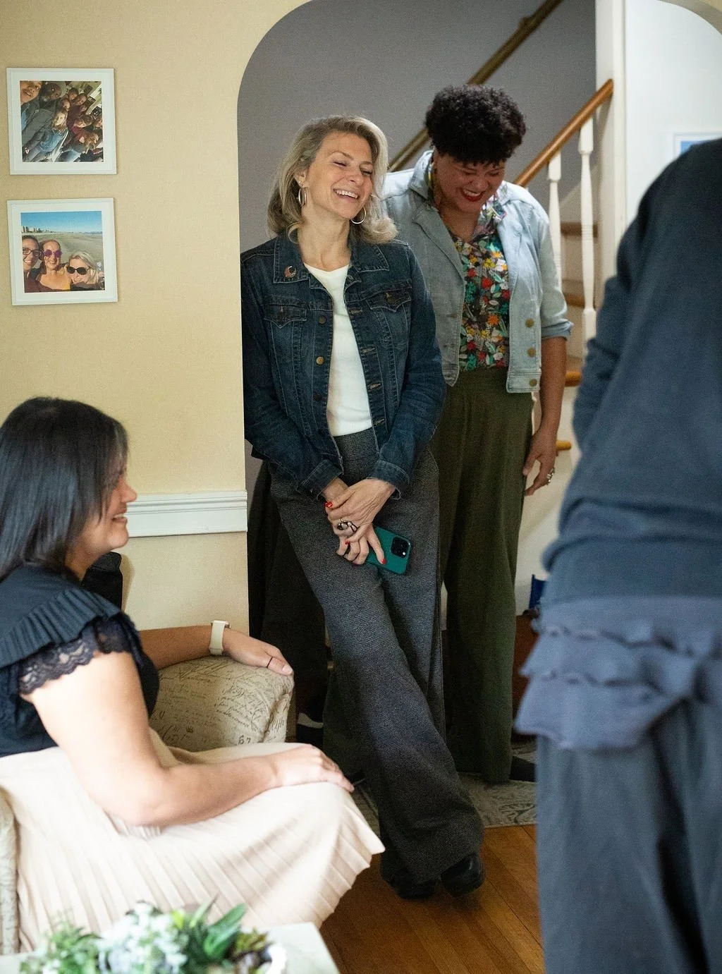 A candid CFR team moment with colleagues laughing and interacting.