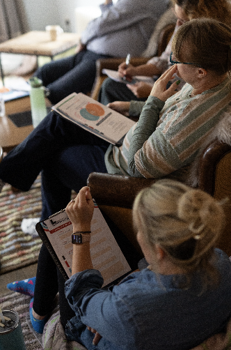 Guests working through their retreat workbooks