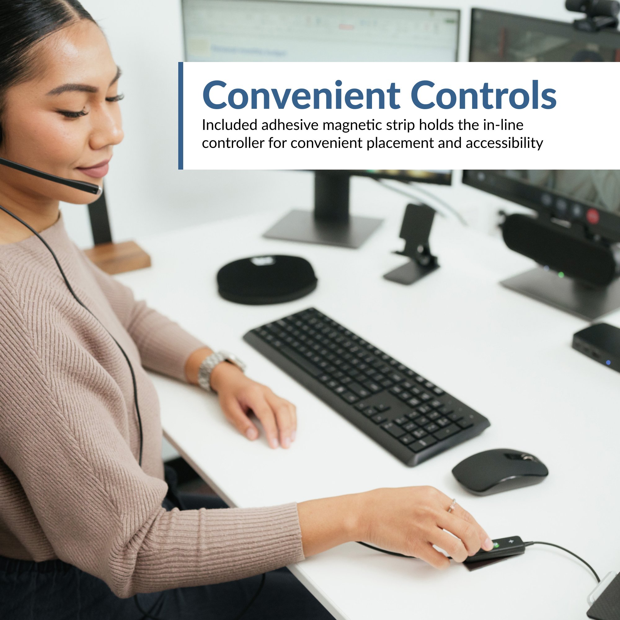 Cyber Acoustics AC-404 headset in use showing in-line USB controller with volume and microphone mute buttons placed on a desk using a magnetic strip